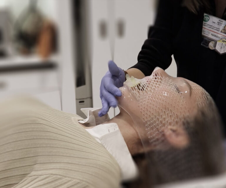 Stentra being positioned in a patient's mouth before radiation treatment